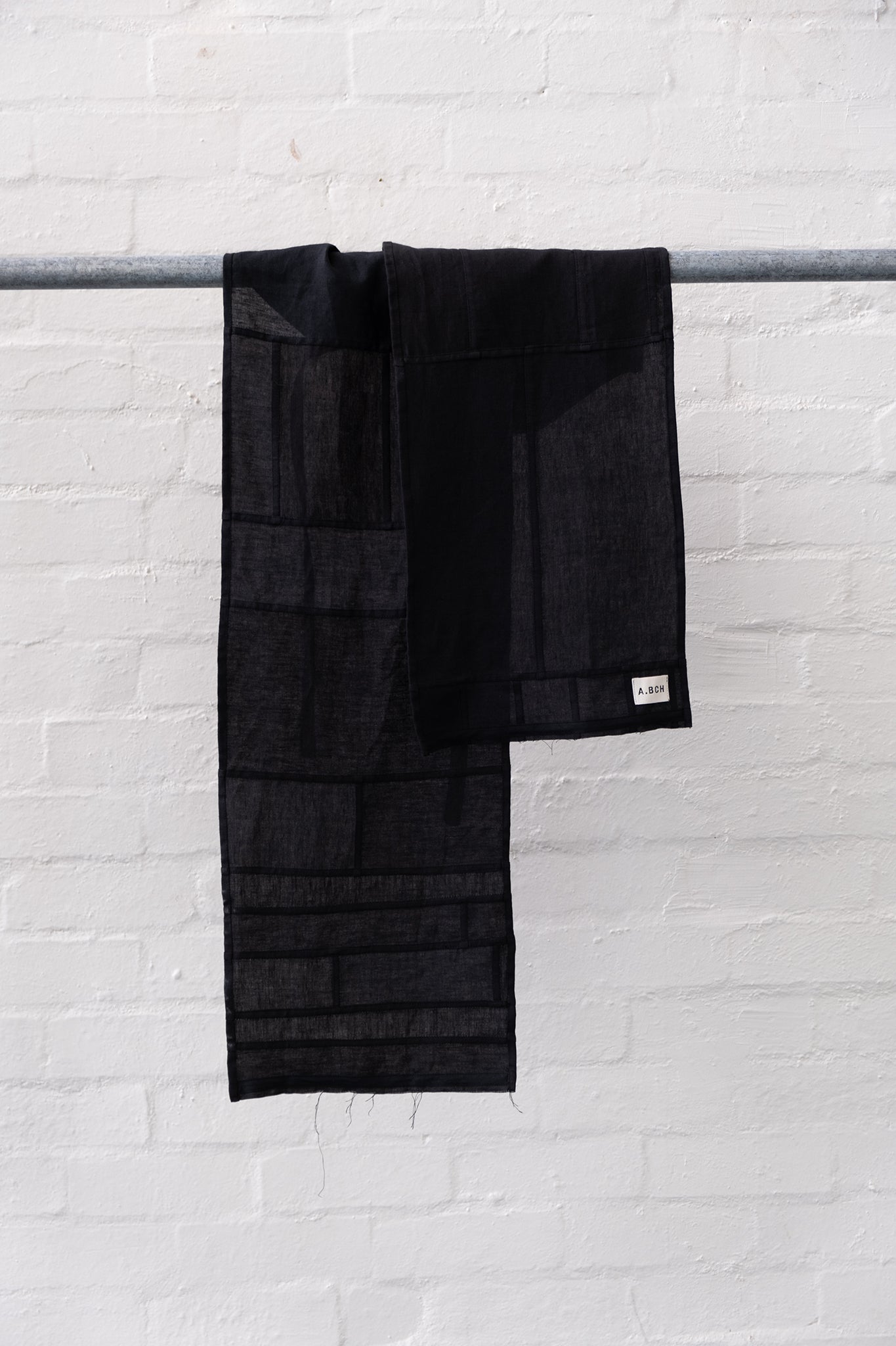 Red Line - The Styling Piece Black in organic linen offcuts